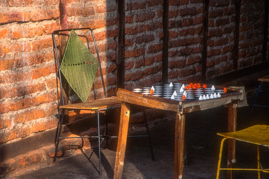 brown wooden table with chairs