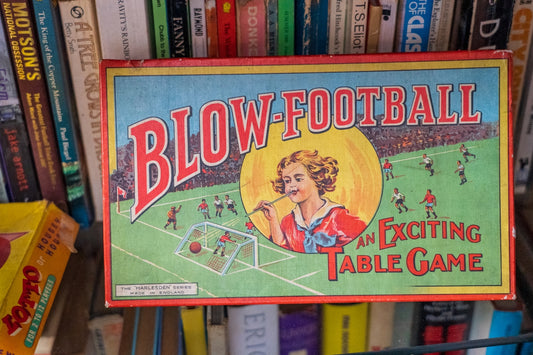 the big one book on brown wooden shelf