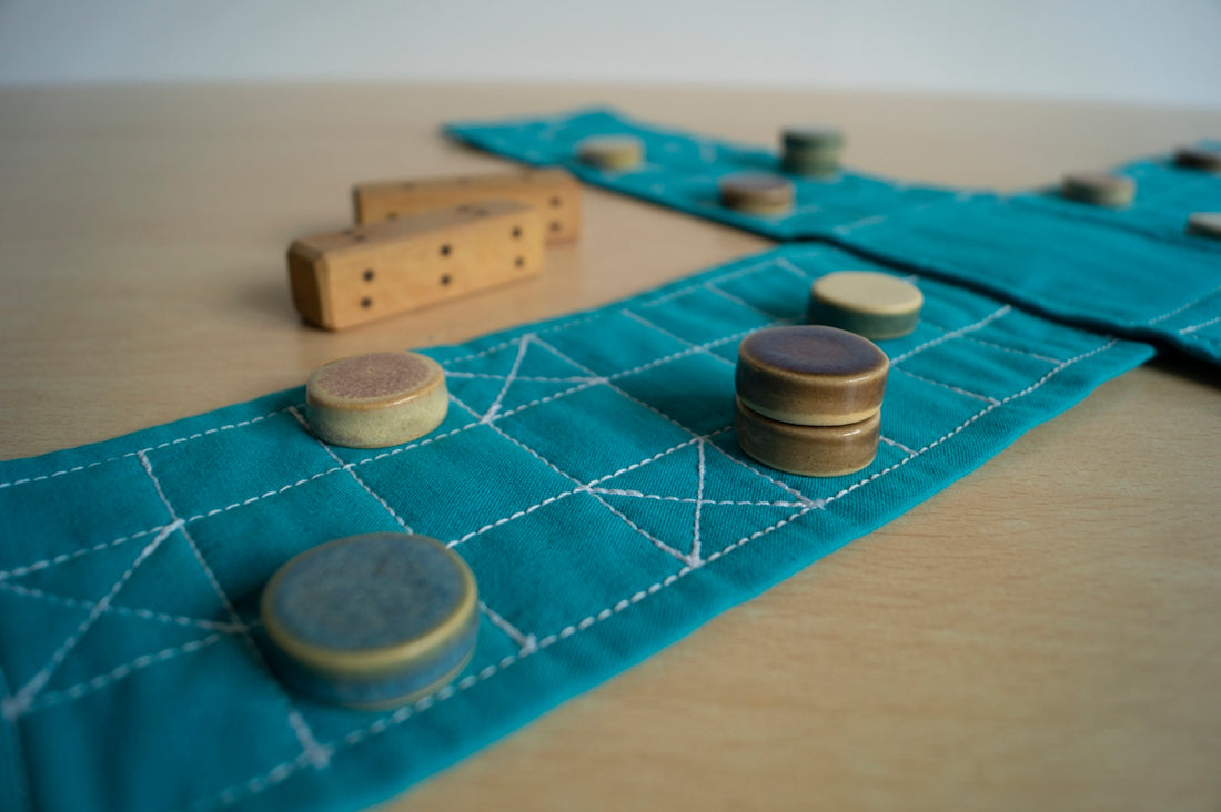 a close up of a table with buttons and a piece of cloth