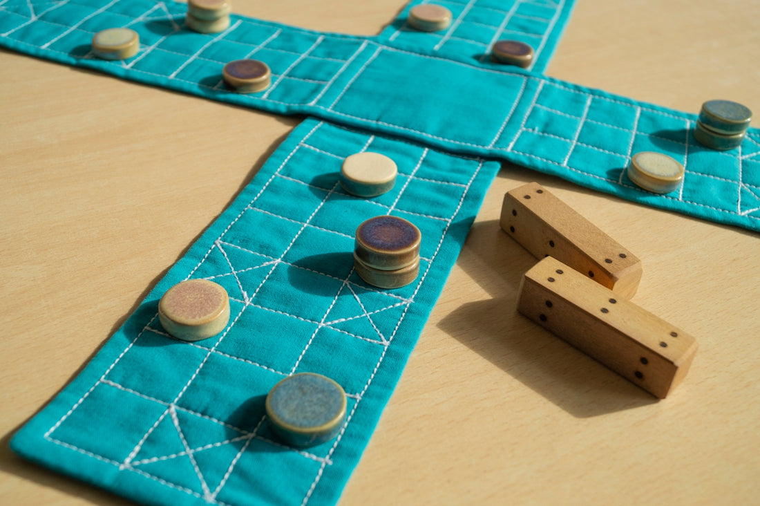 a close up of a game of dominos on a table